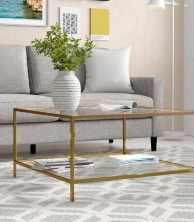 ترابيزة قهوة ذهبية من الستيل المطلي بسطح زجاجي – Verve Home